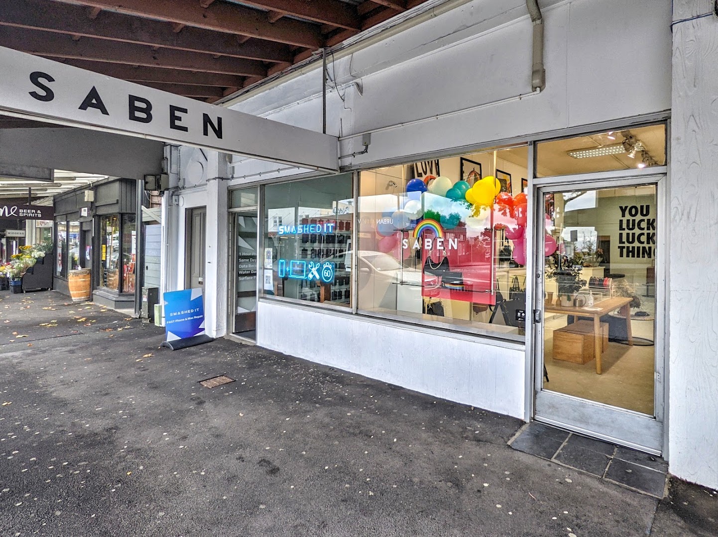 SABEN: clear storefront photo showing branding