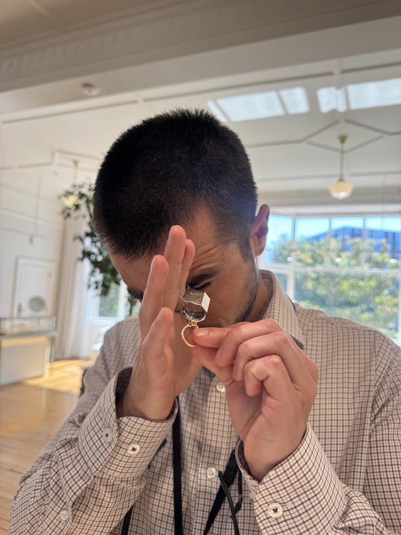 Naveya & Sloane: professional staff inspecting jewelry product