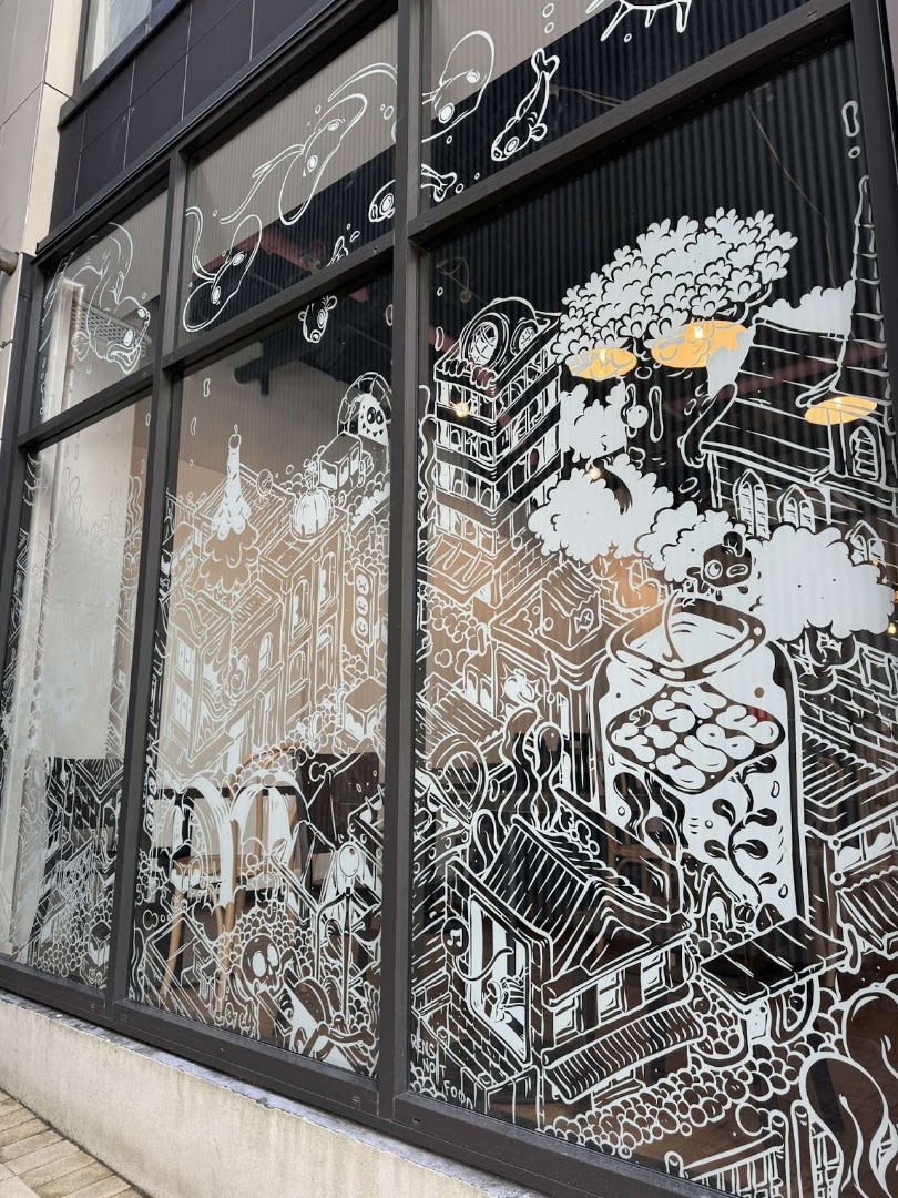 Fishcube Gallery & Café: artistic window display showcases venue