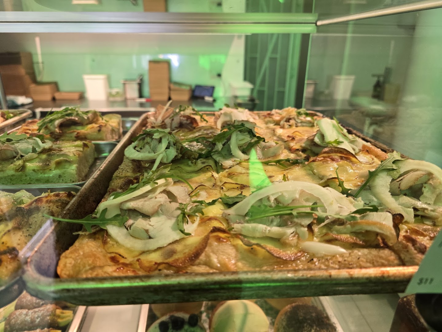 Slice: appetizing display of fresh pizza