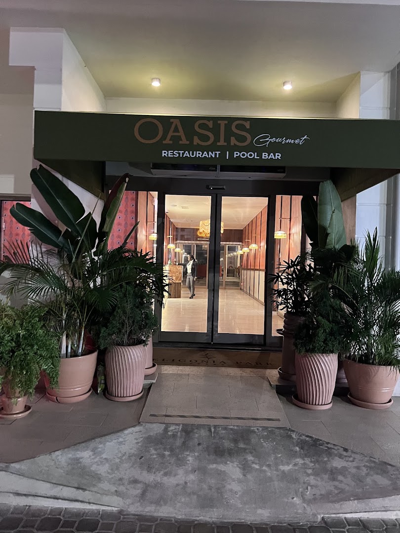 Oasis Gourmet: clear, professional exterior restaurant shot