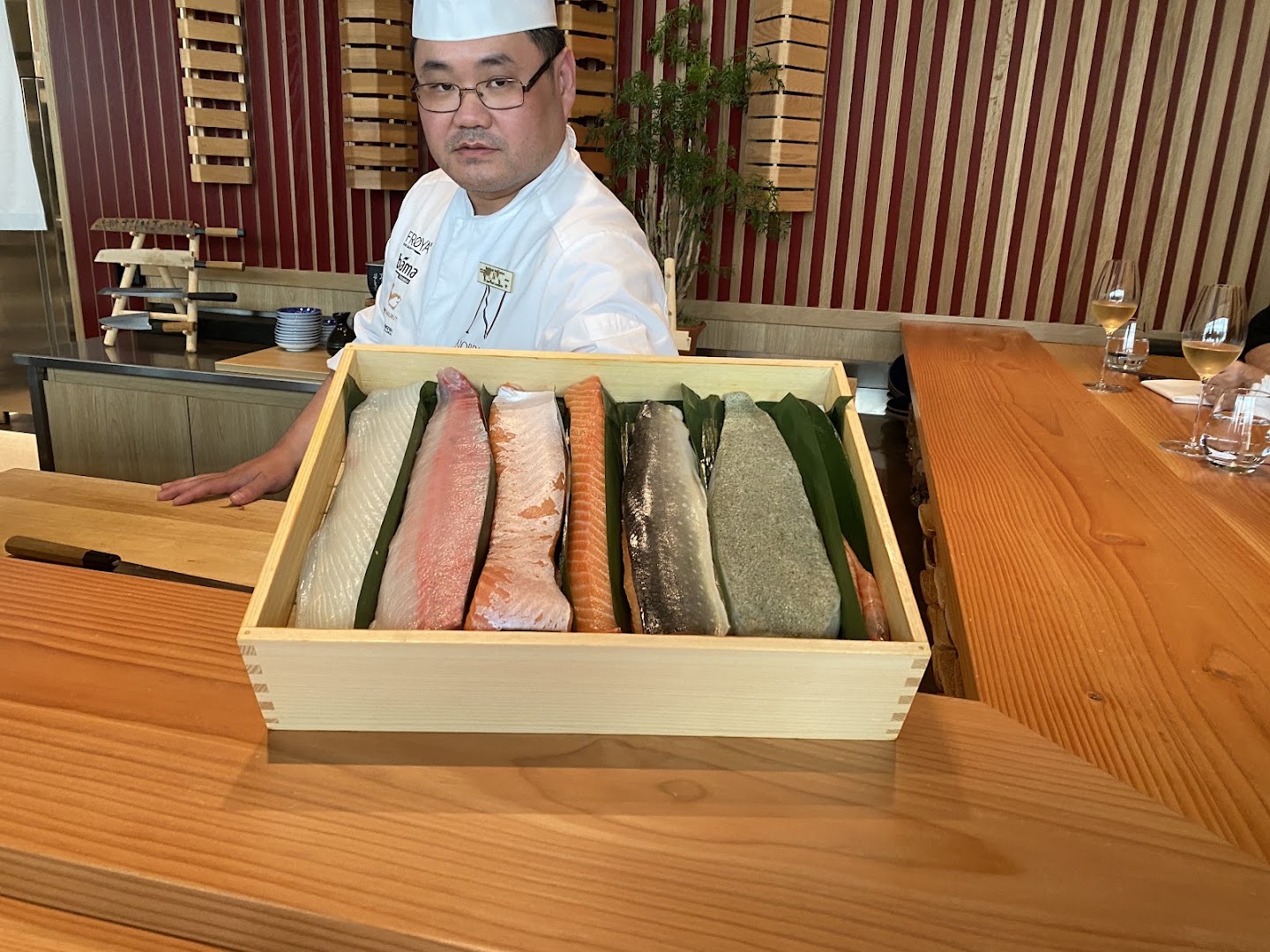 Omakase by Sergey Pak: professional chef presenting fresh ingredients