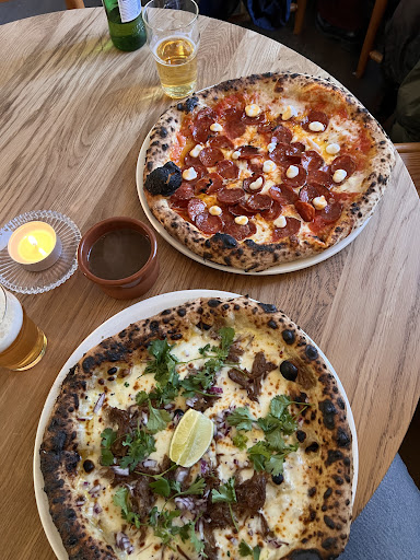 Duken Bar & Pizza: appetizing photo of restaurant food