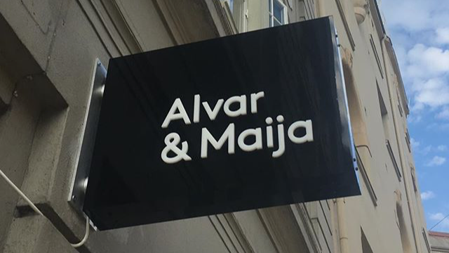 Maija: clear storefront signage photo