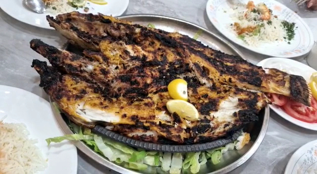 Al Shamaliah Grill & Restaurant: appetizing photo of grilled fish