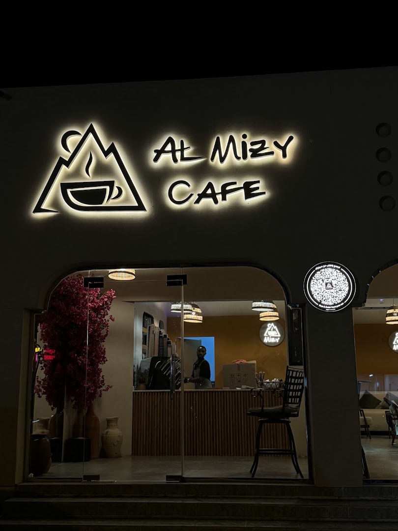 Almizy Cafe: clear, professional exterior night shot
