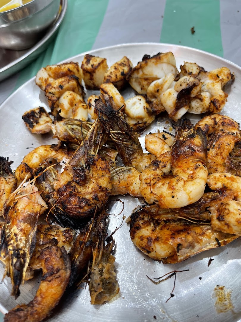 Mazahbi Al Yeman: appetizing photo of grilled seafood