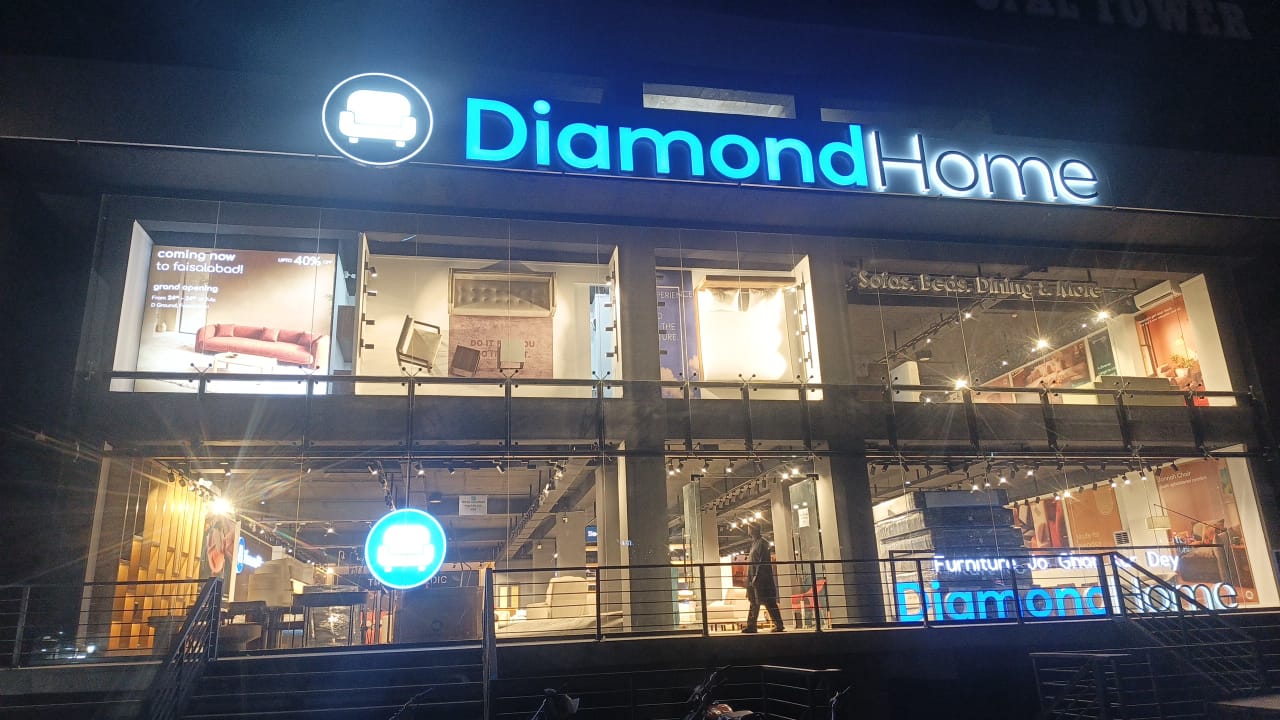 Diamond Home: clear storefront photo at night