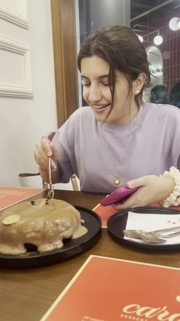 Carabliss: customer enjoying food at venue