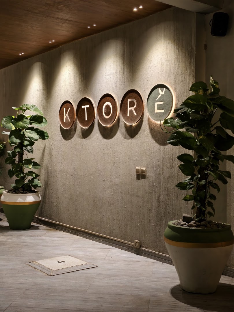 Ktore: professional interior shot showing branding