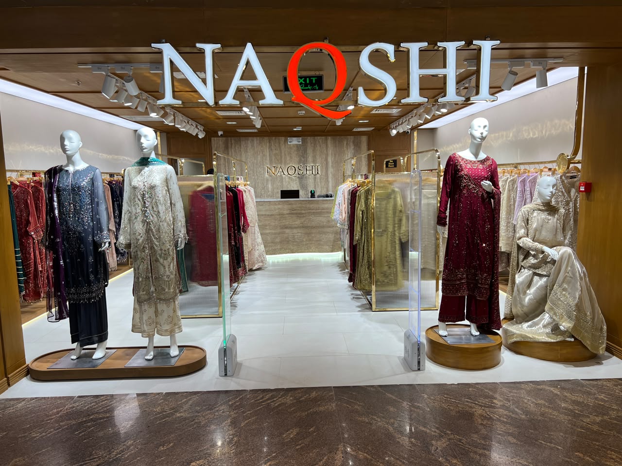 Naqshi: clear storefront and interior display