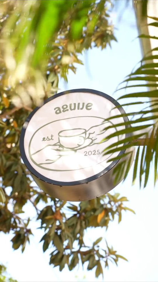 Aguije: clear, professional signage photo
