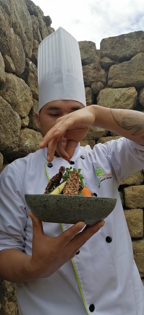 Green House Organic Concept: professional chef presenting signature dish