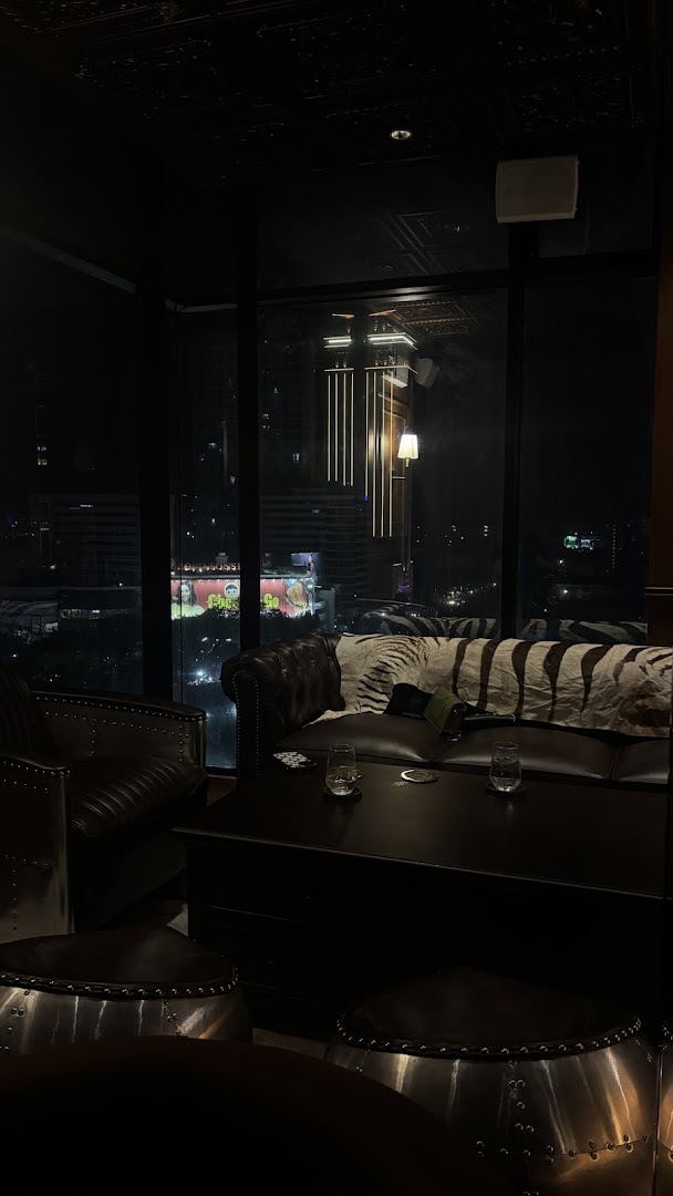 nth Lair: atmospheric interior with city view