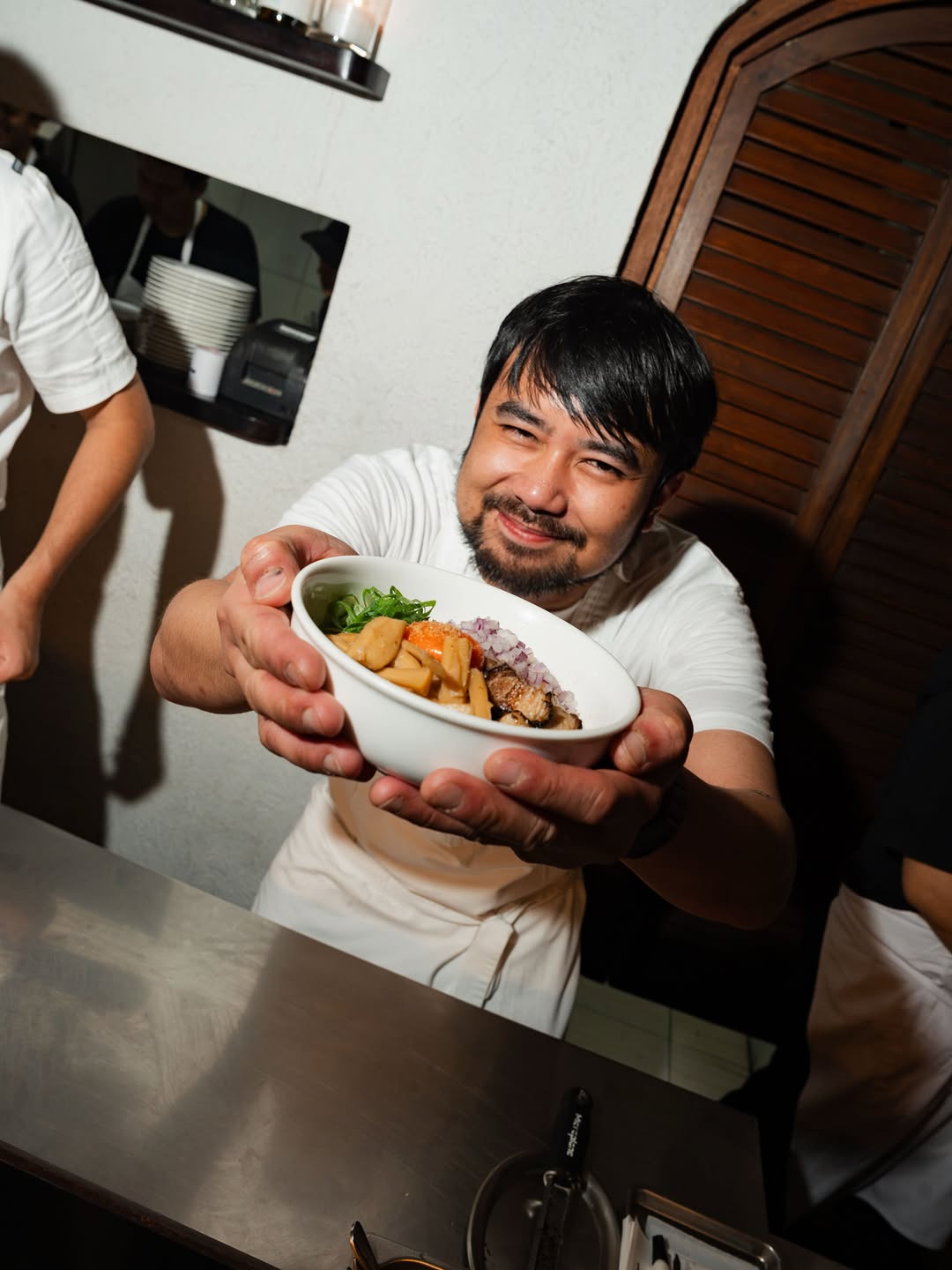 Baka Ramen: professional photo of staff serving