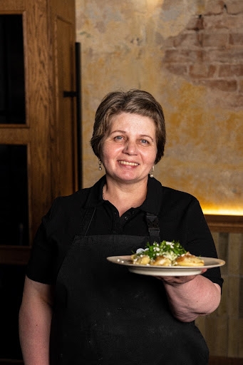 Franca: professional staff portrait with food