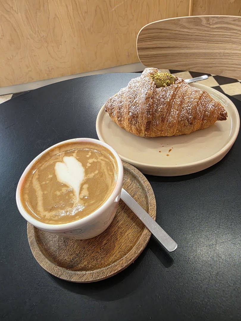 Miejska: appetizing photo of coffee and pastry