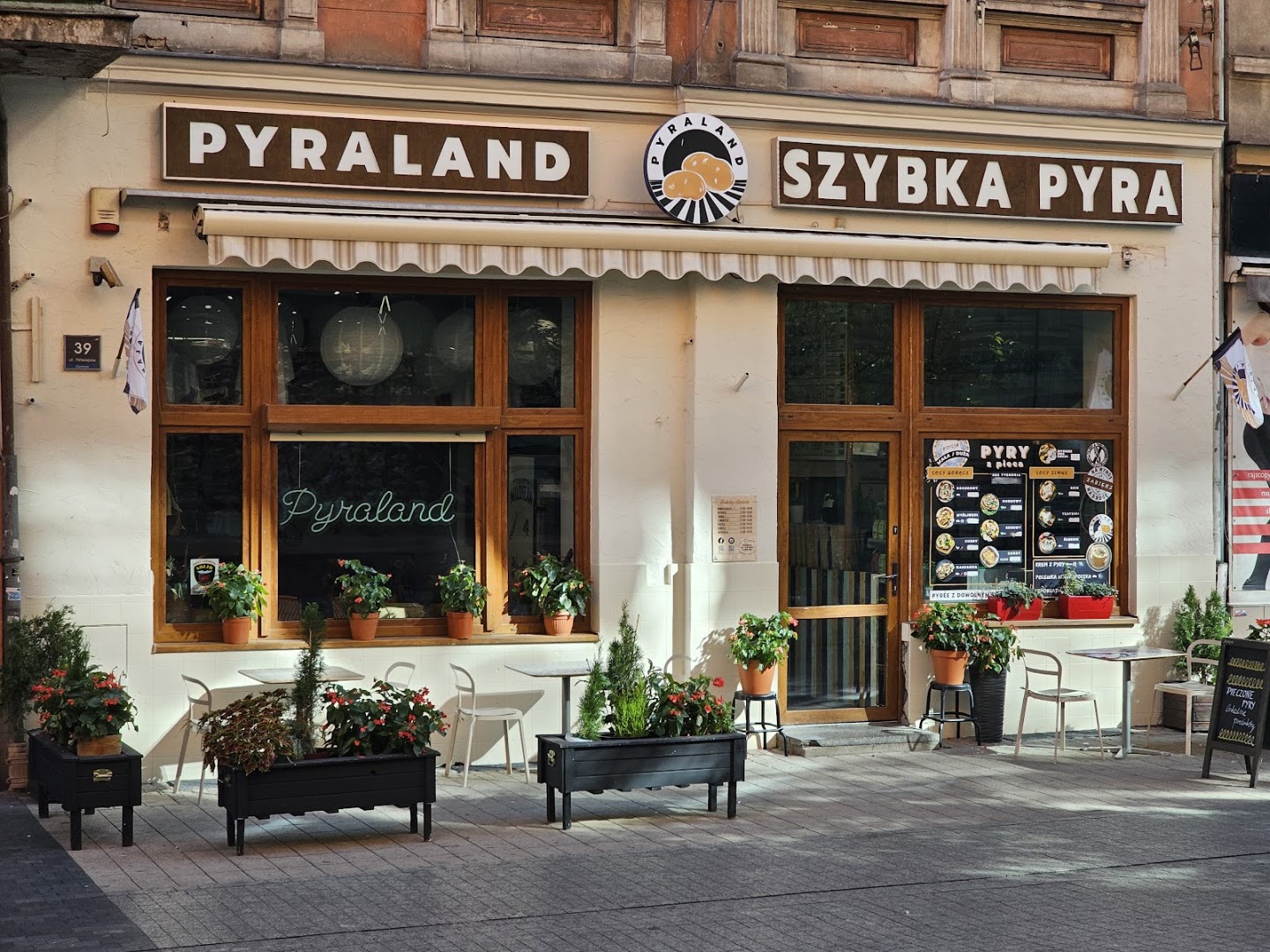Pyraland: clear, professional exterior restaurant shot