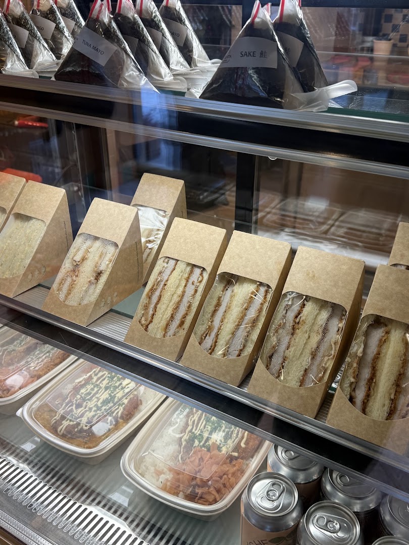 Konbini Coffee & Sando: appetizing display of fresh food