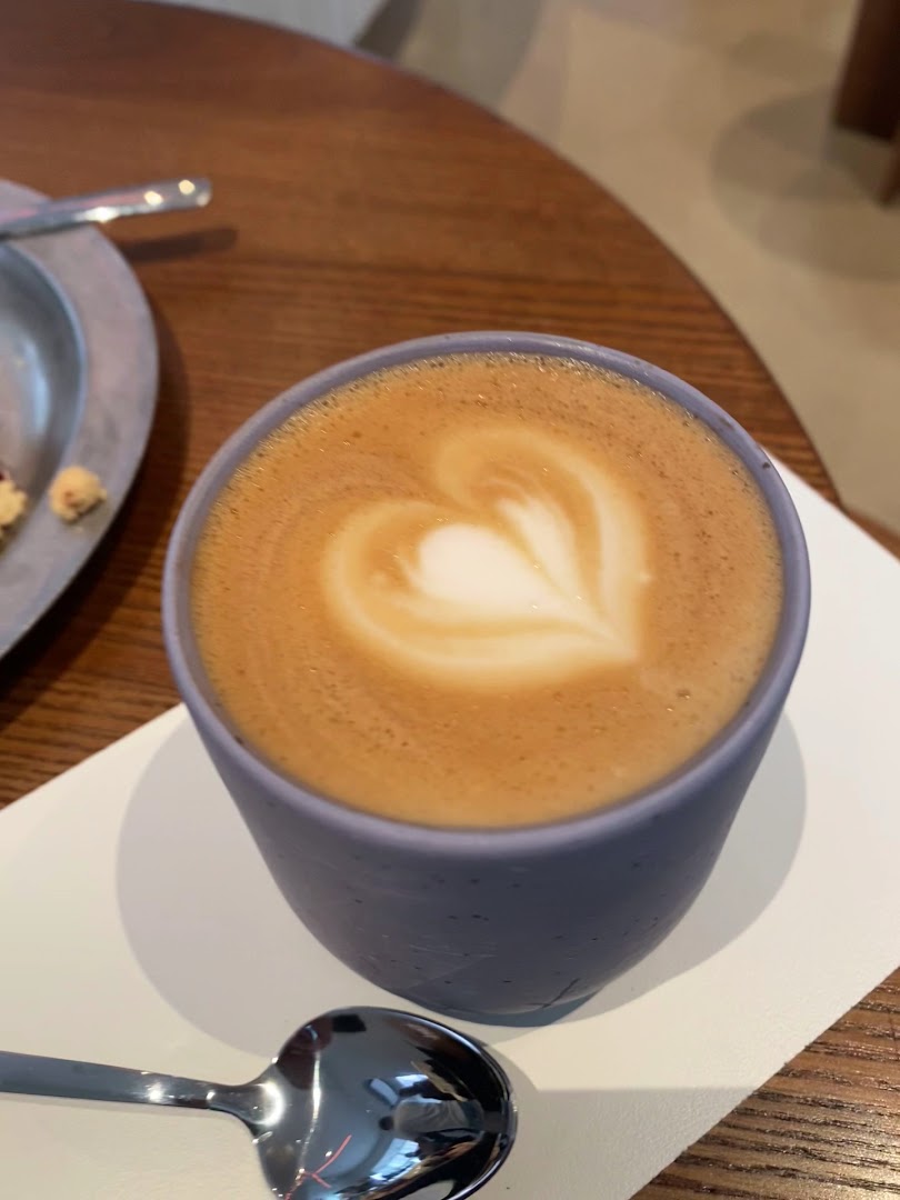 BRÚ speciality coffee & vegan bakehouse: appealing photo of coffee art