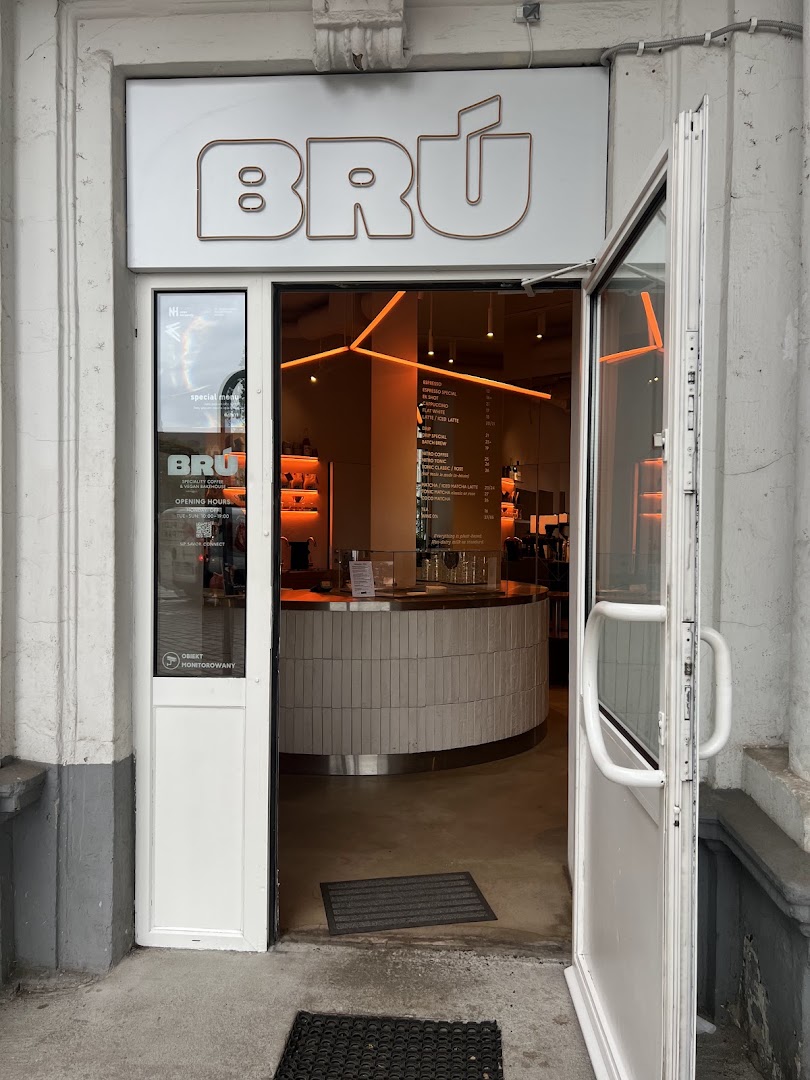 BRÚ speciality coffee & vegan bakehouse: inviting storefront and interior view