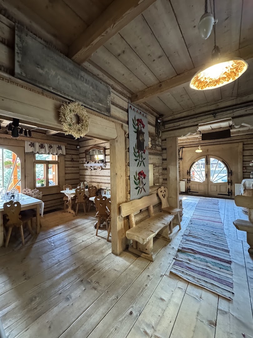 Karczma Przy Młynie: inviting rustic restaurant interior