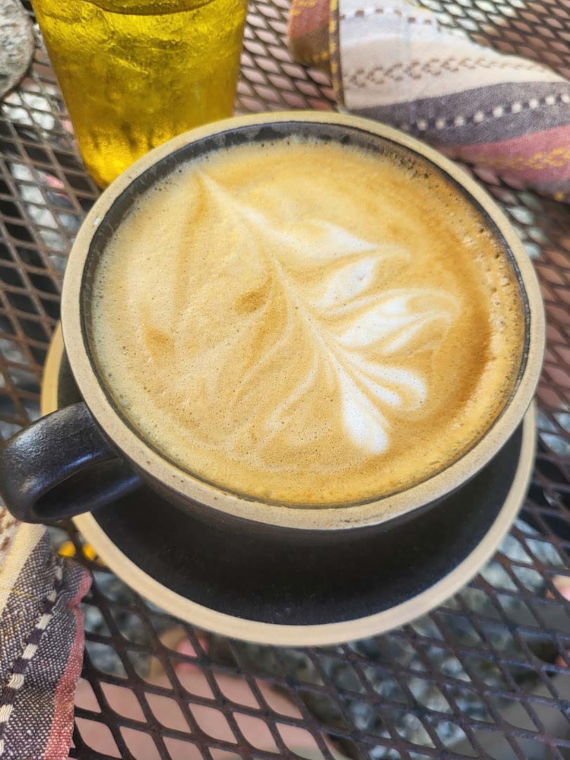 Rising Roost: appetizing latte art photo
