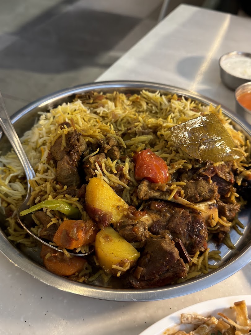 Ginaina Gourmet: appetizing photo of served food