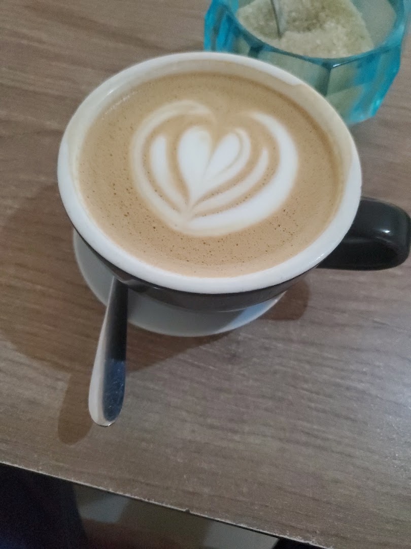 GIA Coffee Shop: appealing latte art coffee photo