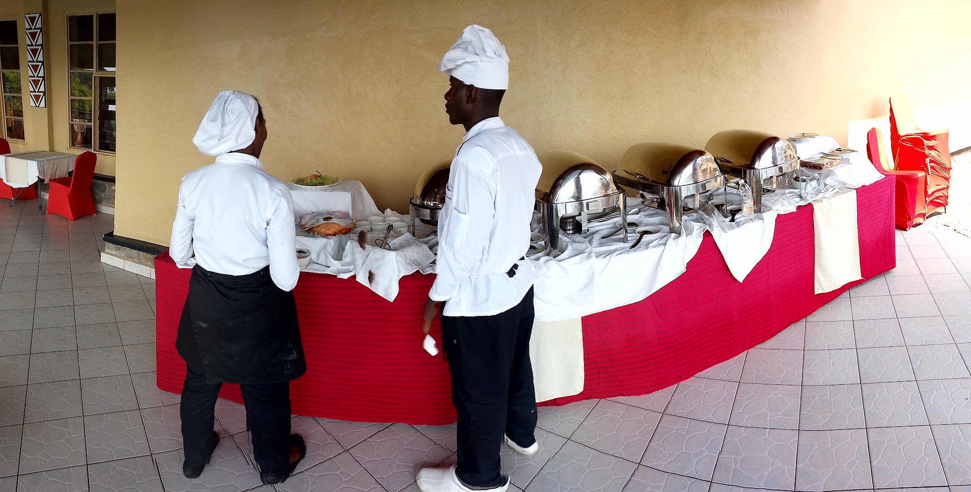 Sailors Resto & Cafe: professional staff preparing buffet service