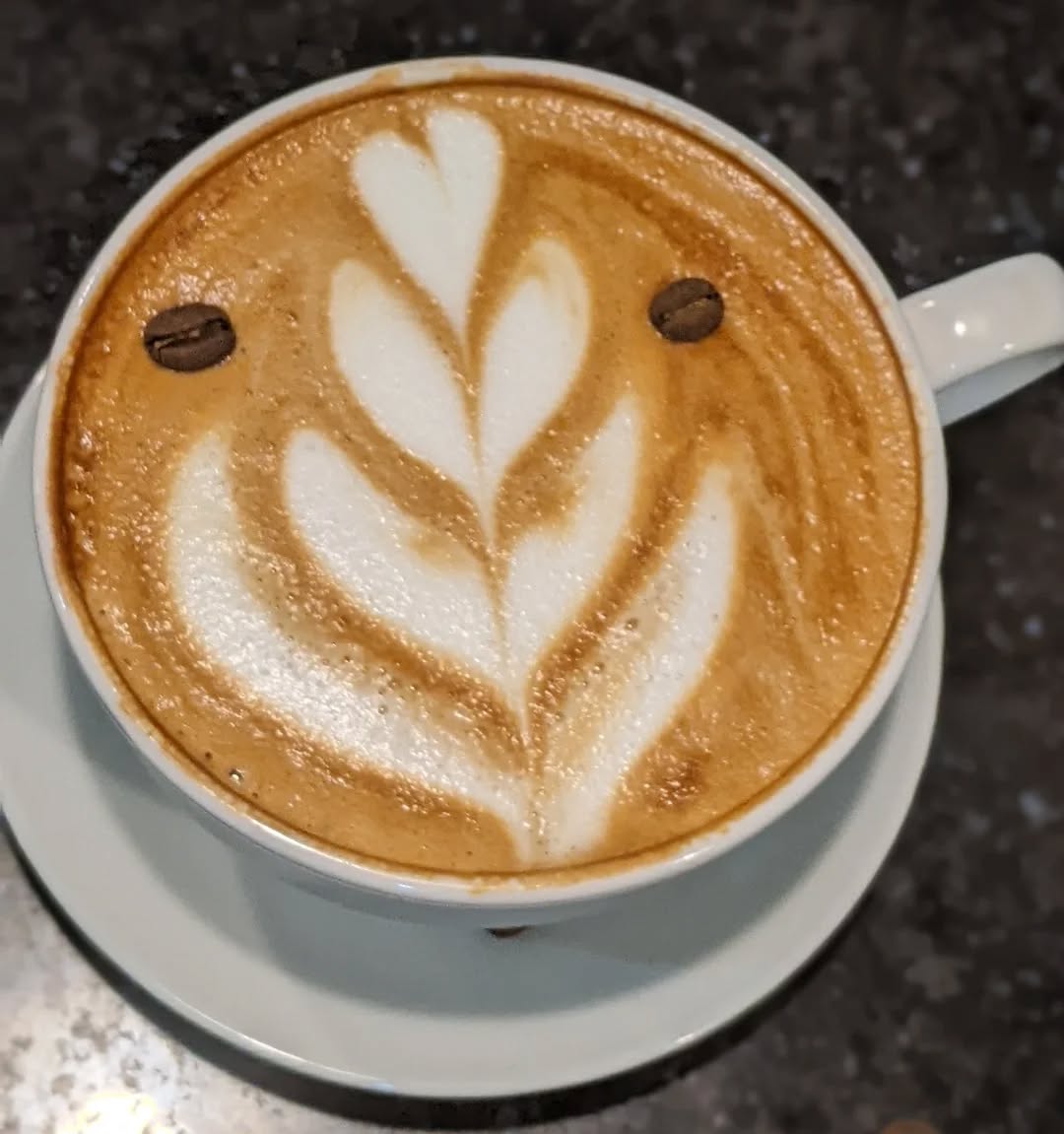 Amikus Coffee & Pizza: appealing latte art photo