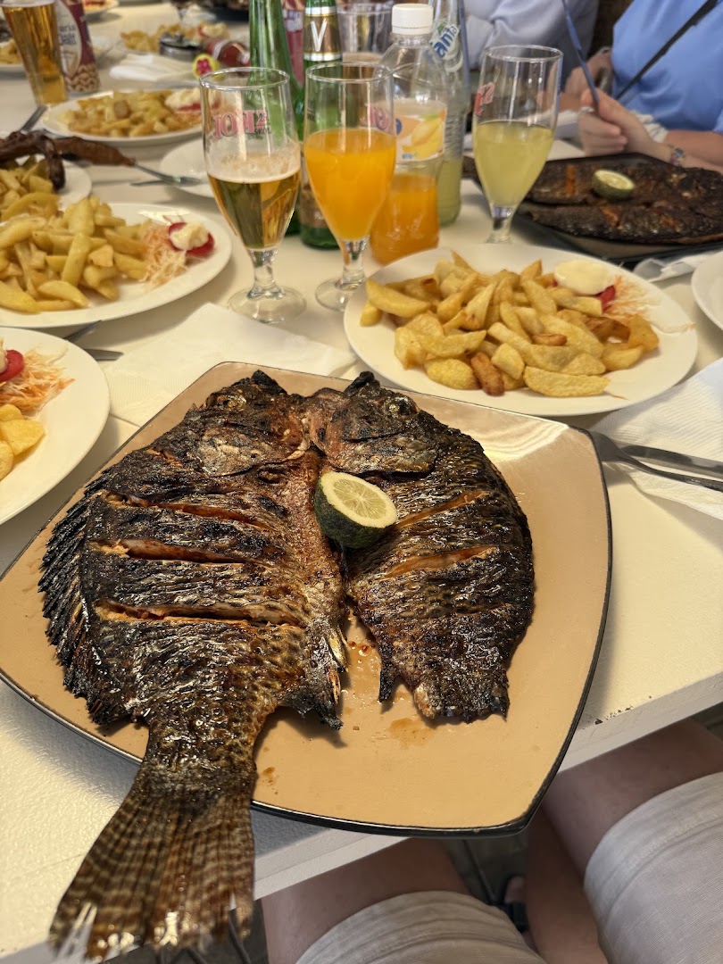 New Tam-Tam Bikini Bar & Restaurant: appetizing photo of restaurant food