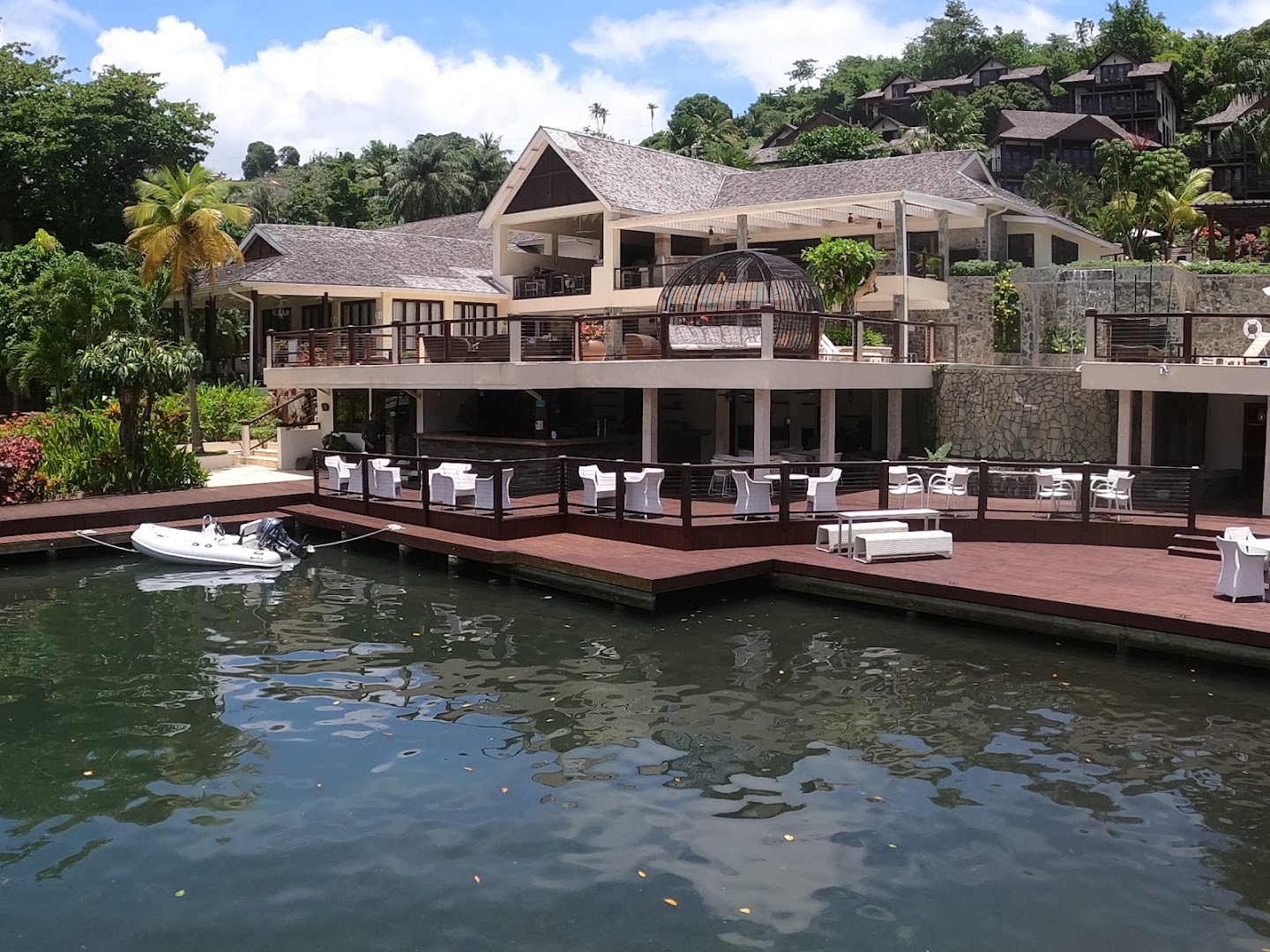 Roots Beach Bar: attractive exterior and waterfront setting