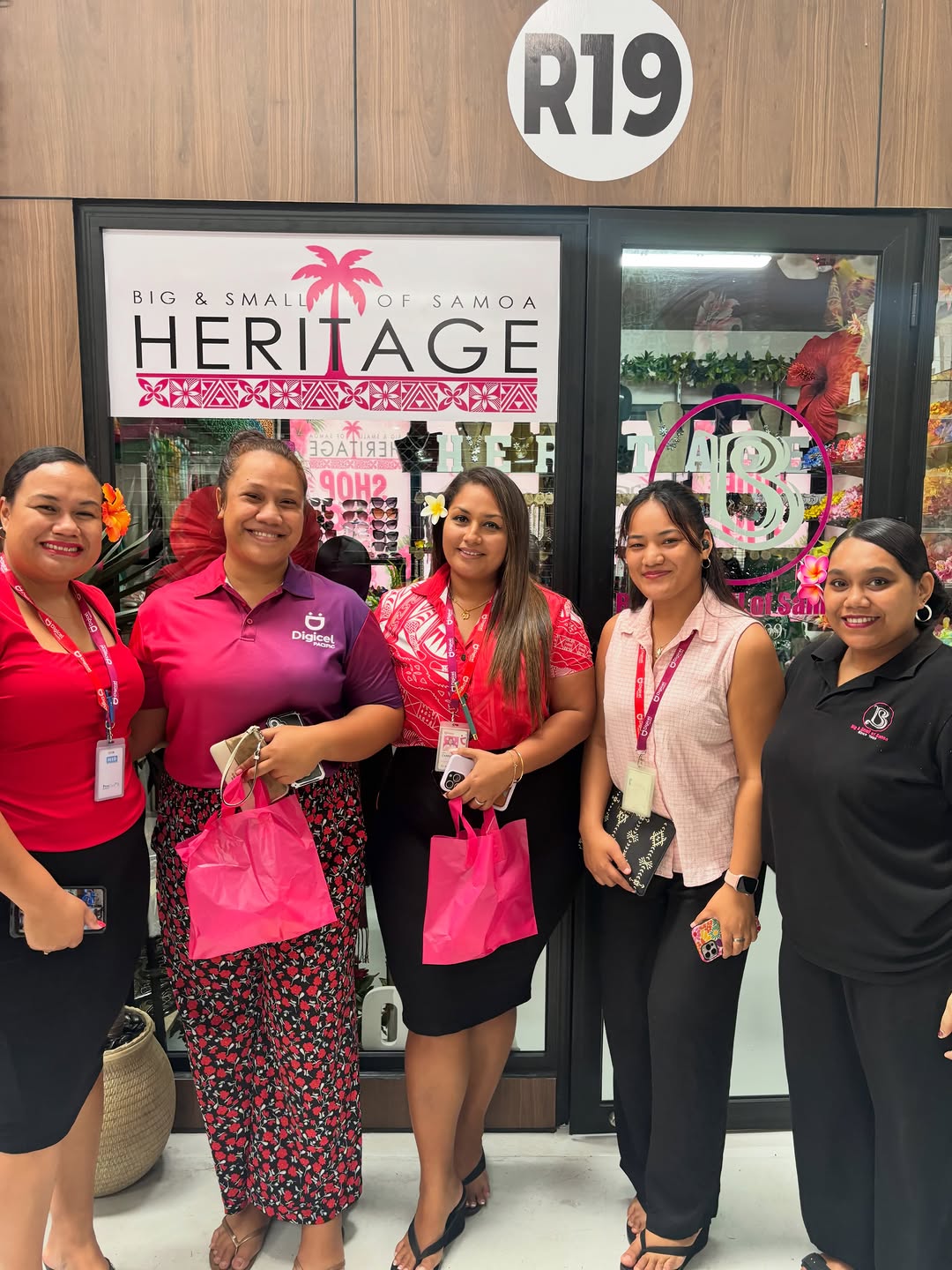 Big & Small of Samoa: staff photo at shop entrance