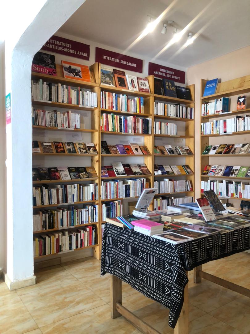 Librairie Café Plumes du Monde: clear, inviting bookstore interior