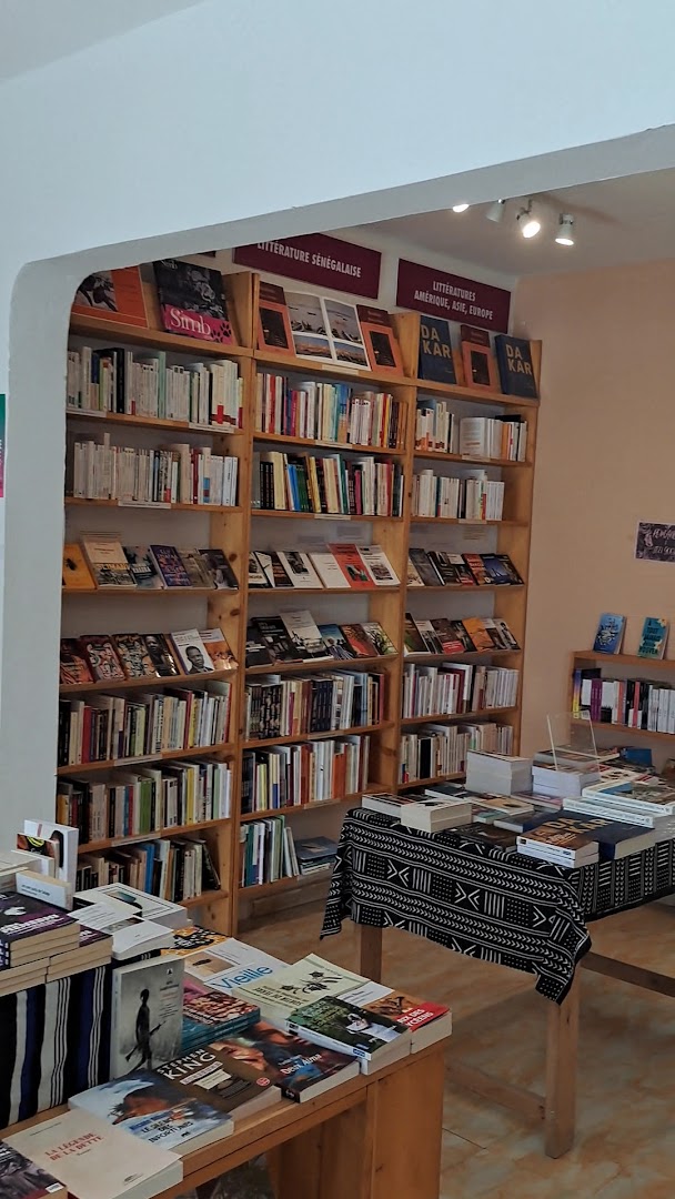 Librairie Café Plumes du Monde: clear view of bookstore interior