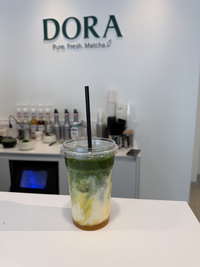 Dora: appetizing drink photo with branding