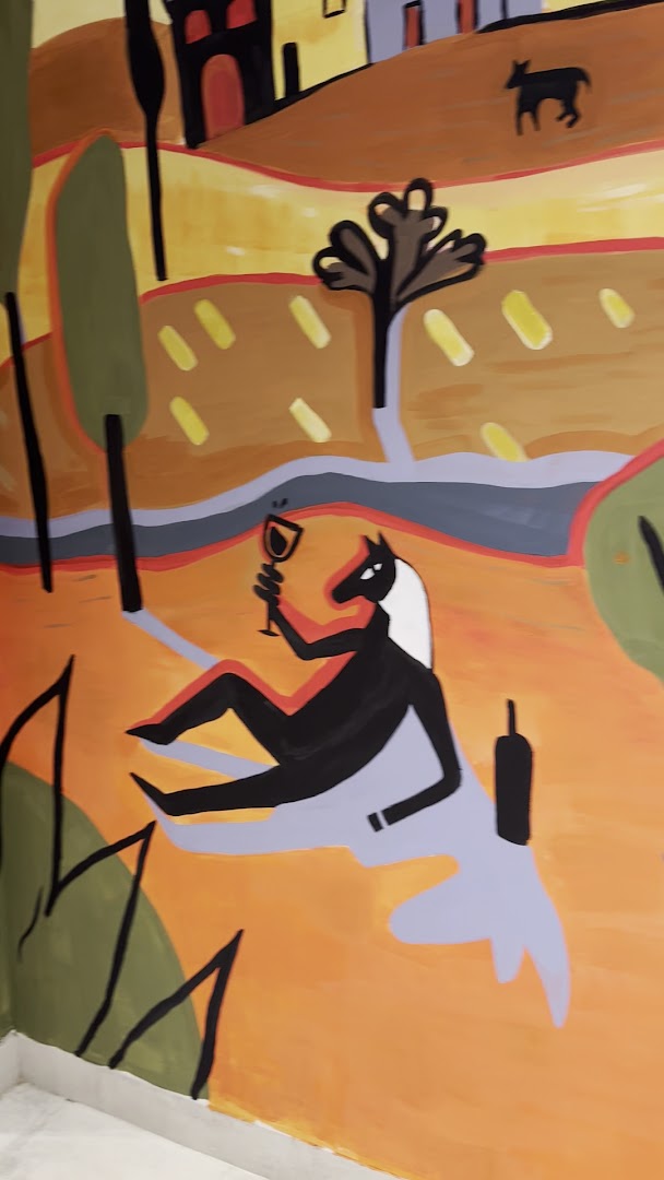 Komuna Gastro Bar: artistic mural reflects venue atmosphere