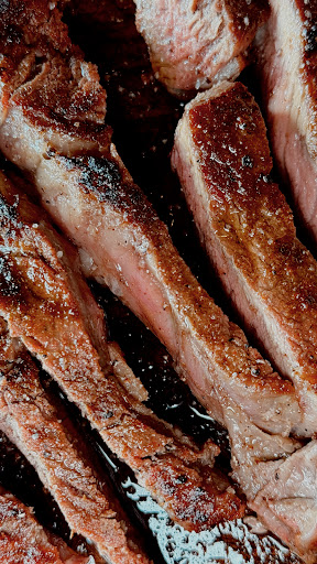 Taurus: appetizing close-up of cooked steak