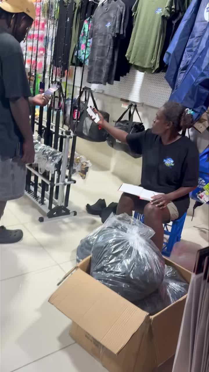 Solomon Pro Fishing & Dive Shop: staff assisting a customer