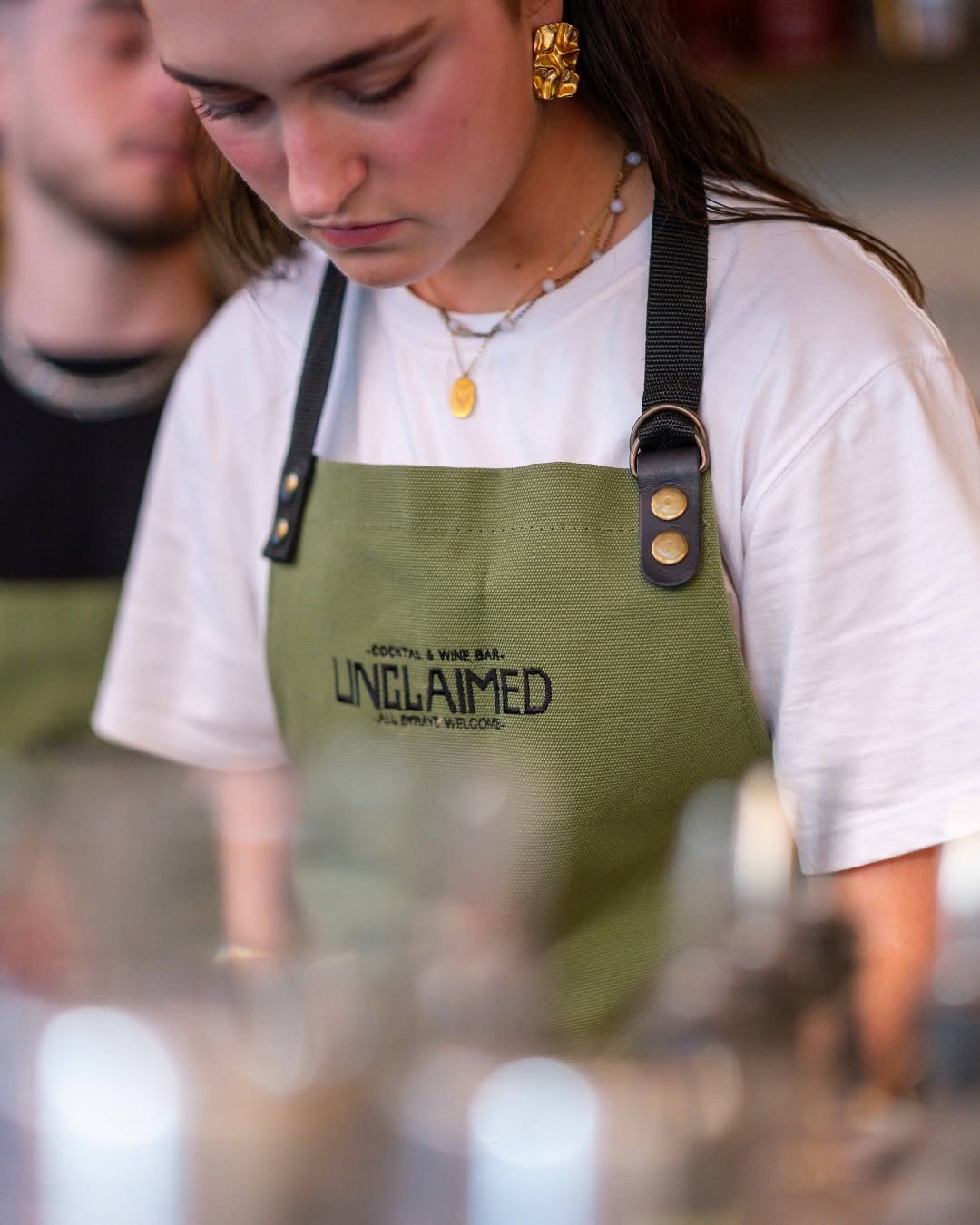Unclaimed Bar: professional photo of staff member