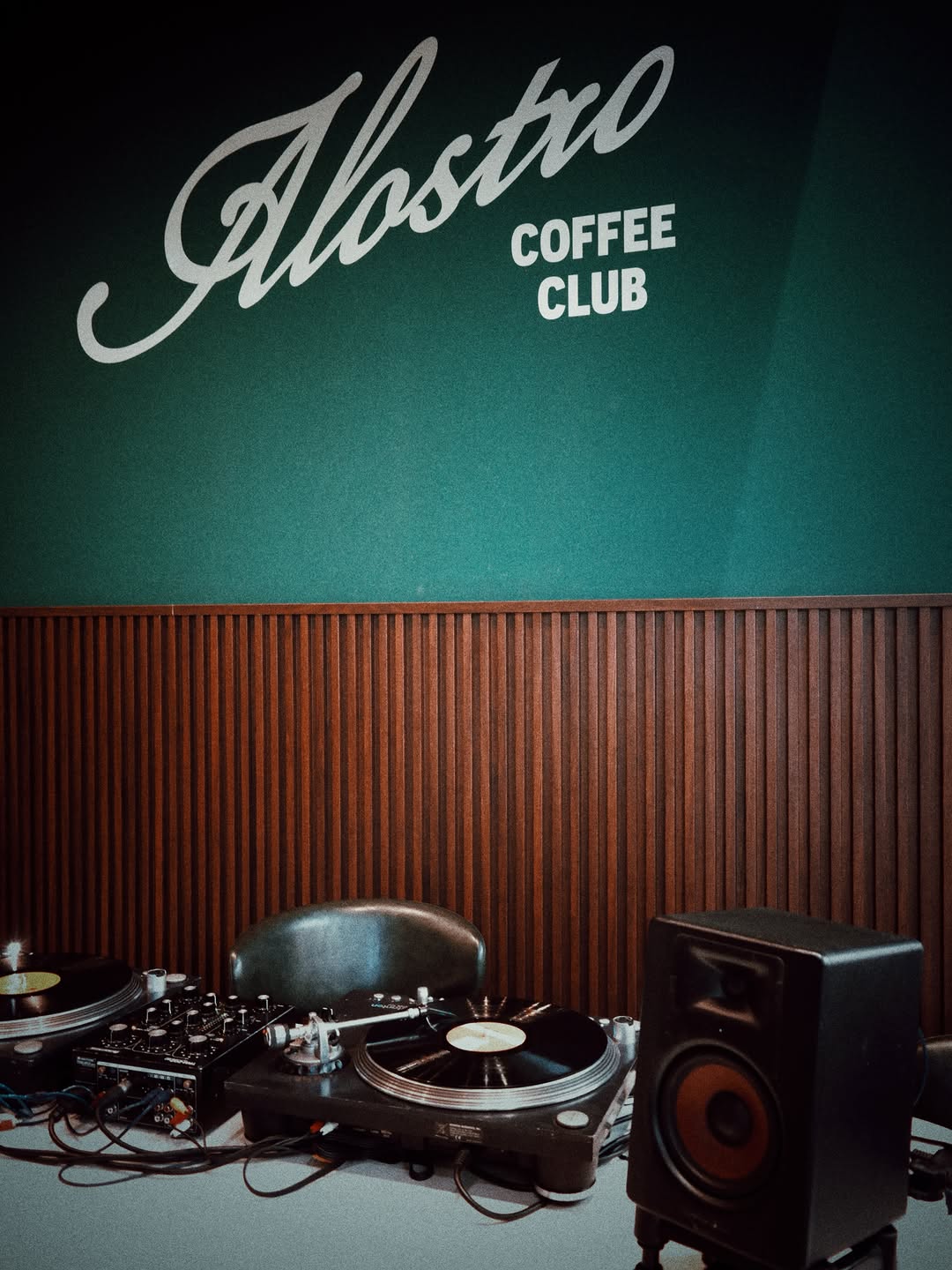 Alostro Coffee Club: stylish interior with brand signage