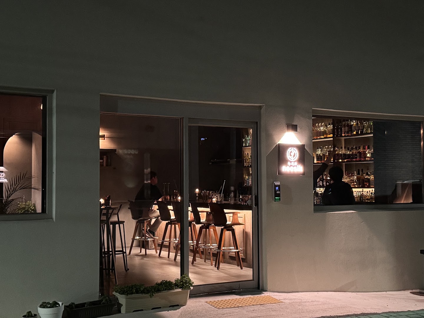 Noosik: inviting exterior view of bar