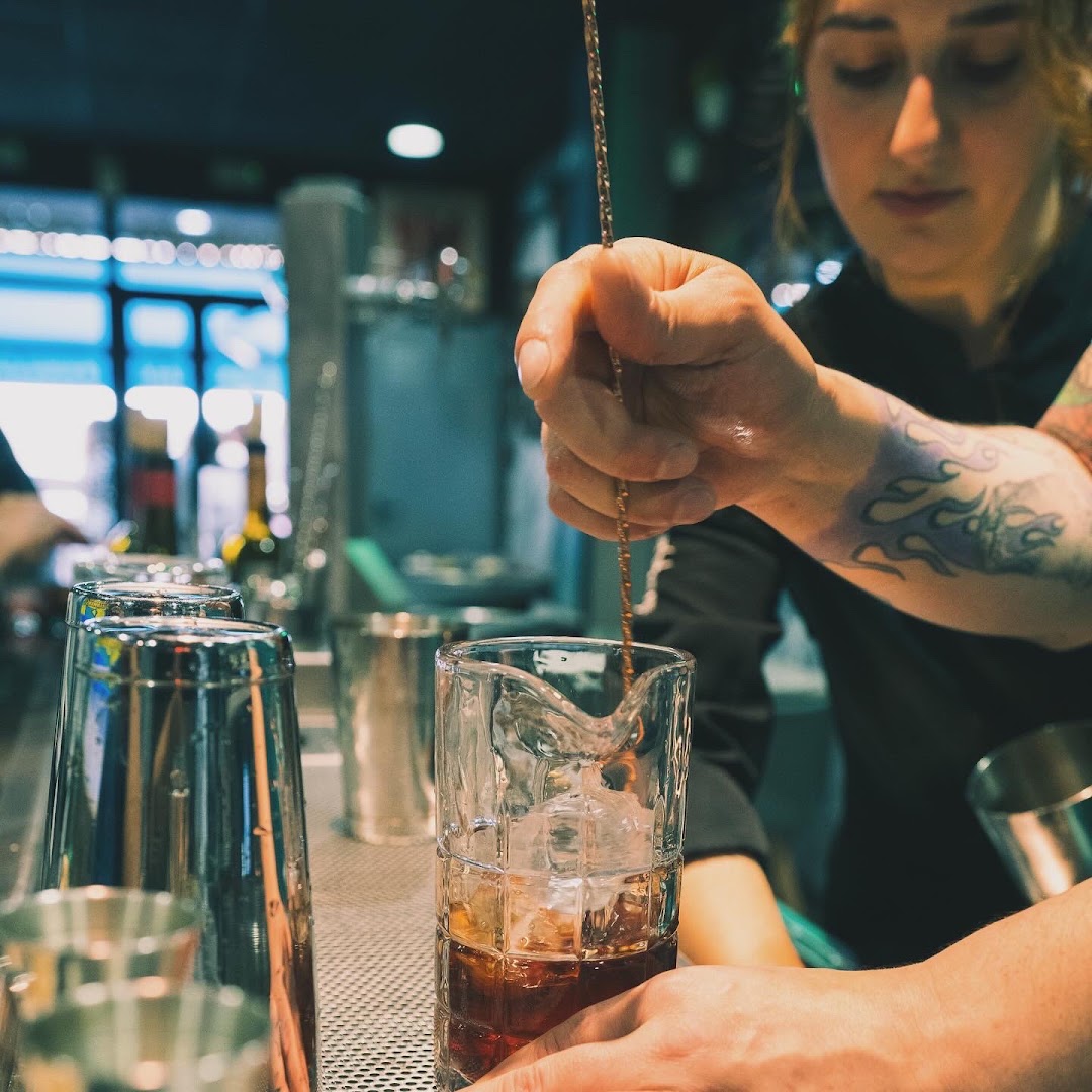 Boulevardier: professional shot of bartender mixing