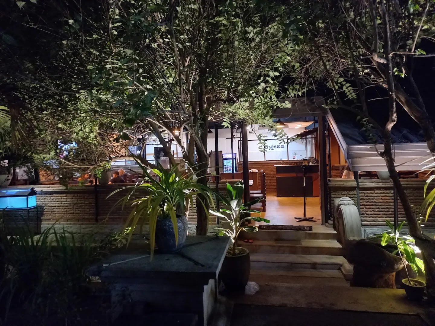 Palhena Village Restaurant: inviting evening atmosphere of restaurant