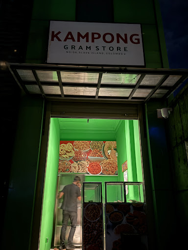 Kampong: clear storefront photo of venue