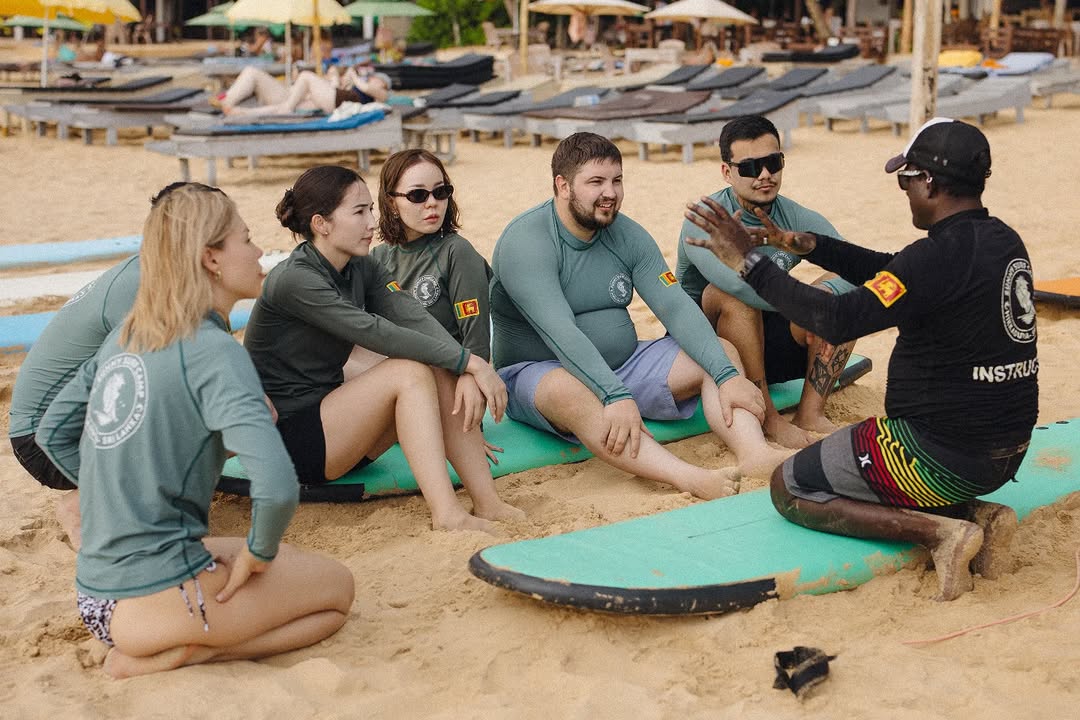 Sunny Surf Camp: professional photo showing surf instruction