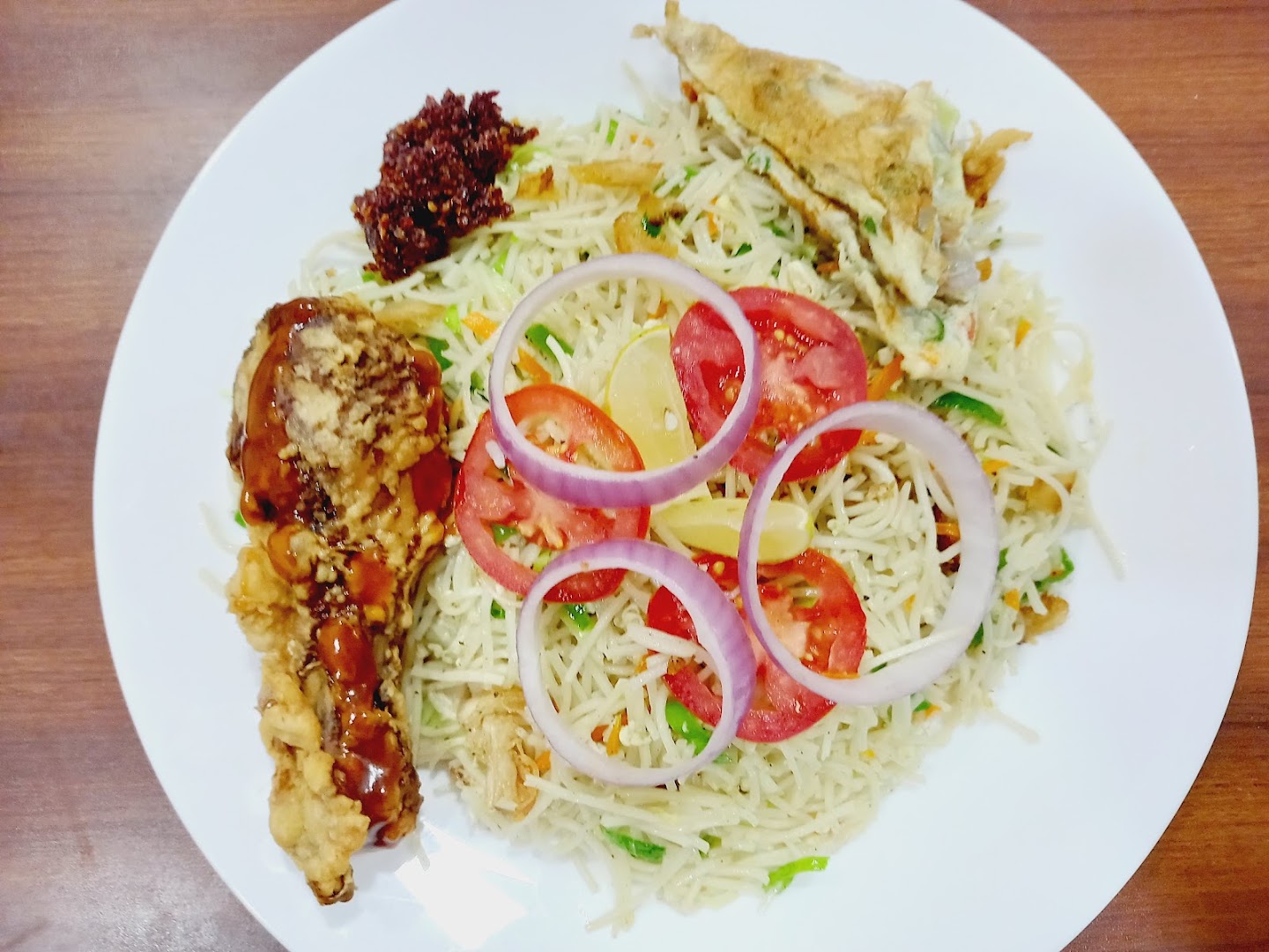 Nizhal Cafe and Restaurant: appetizing, clear photo of food