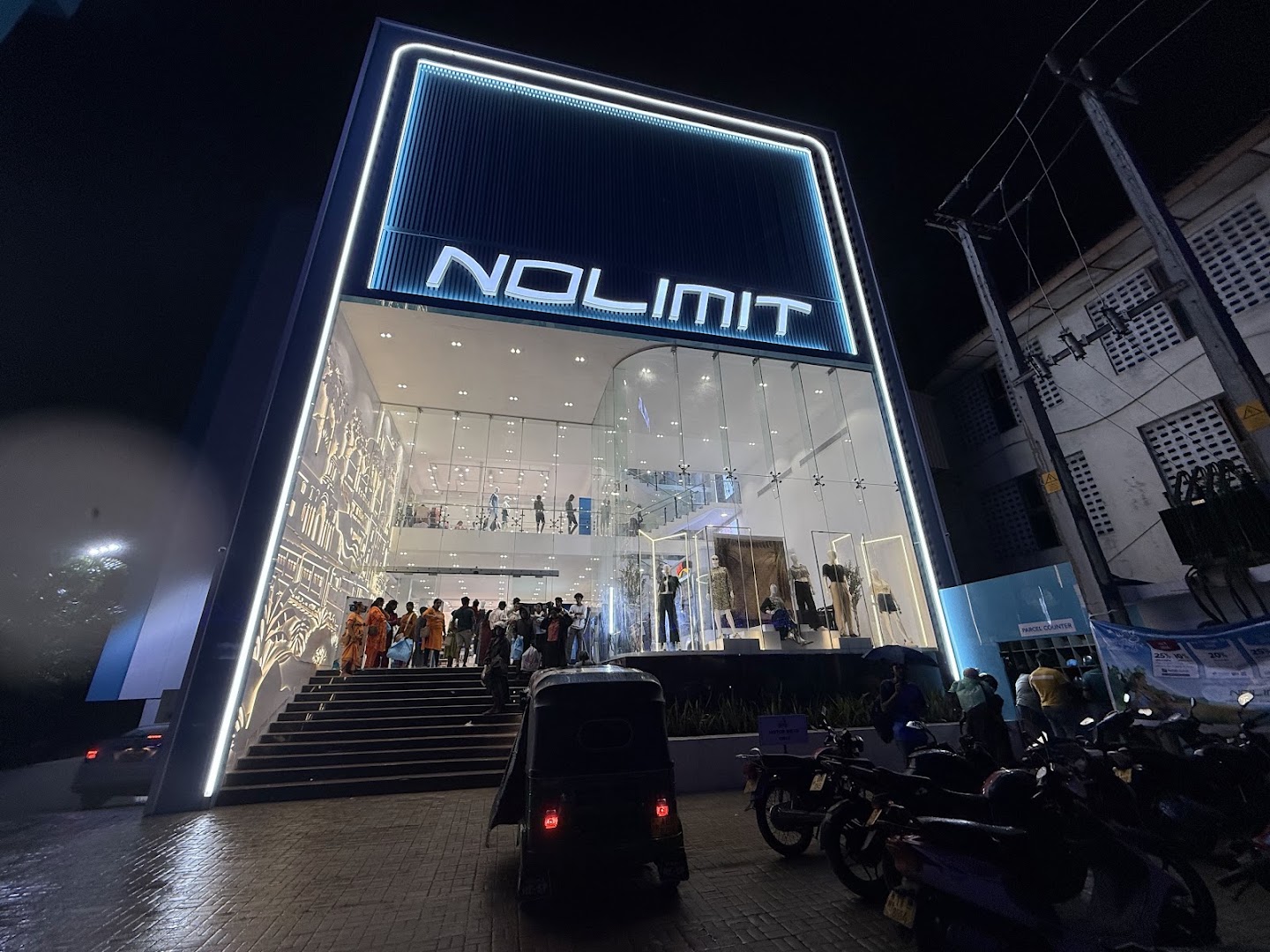 NOLIMIT Jaffna: clear, professional storefront night shot