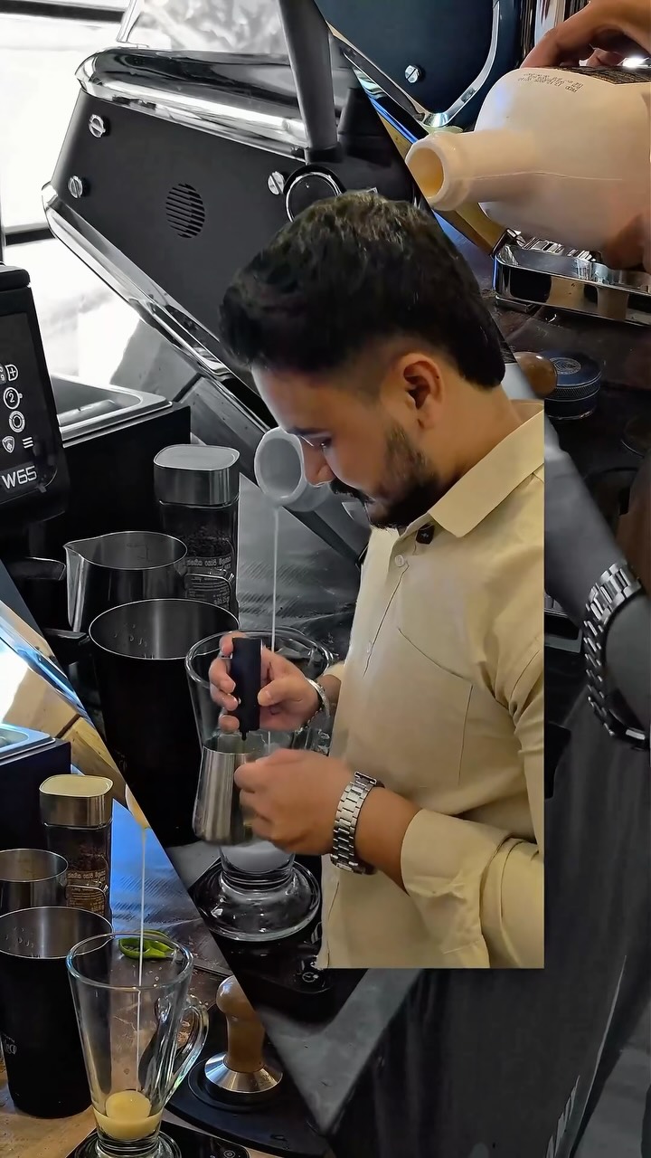 Colombo Coffee Company: professional barista preparing coffee drink